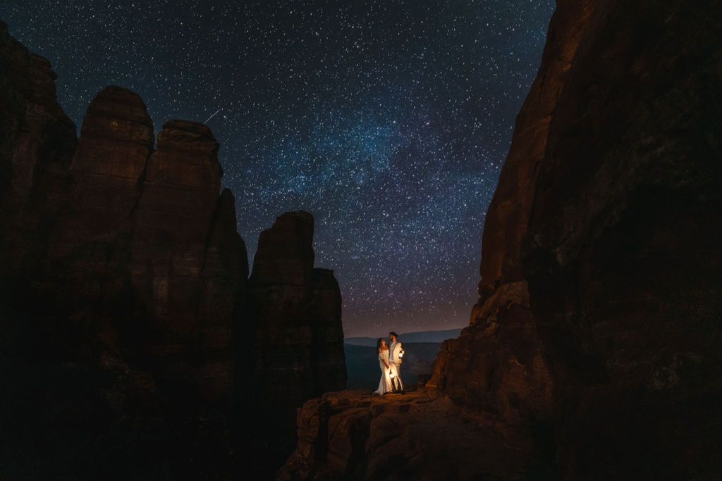 beautiful couple kissing under the stars in arizona