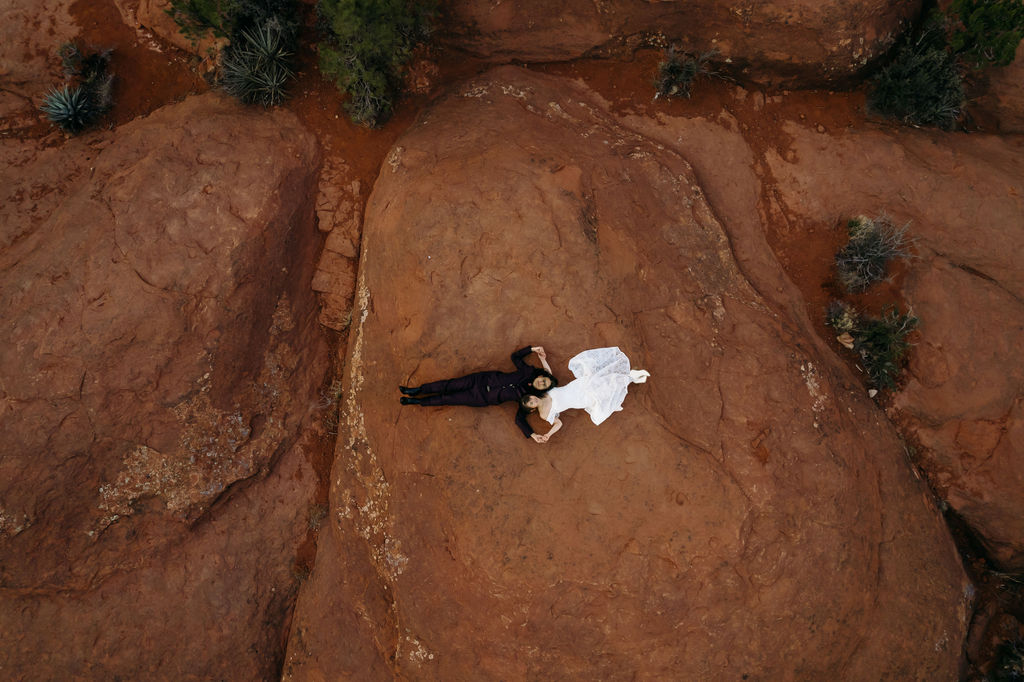 couple looking at the sky during their sedona elopement