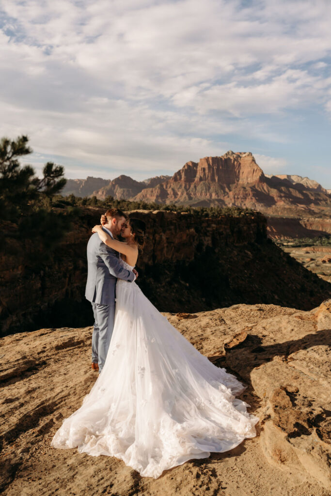 couple kissing at their intimate mountain elopement 