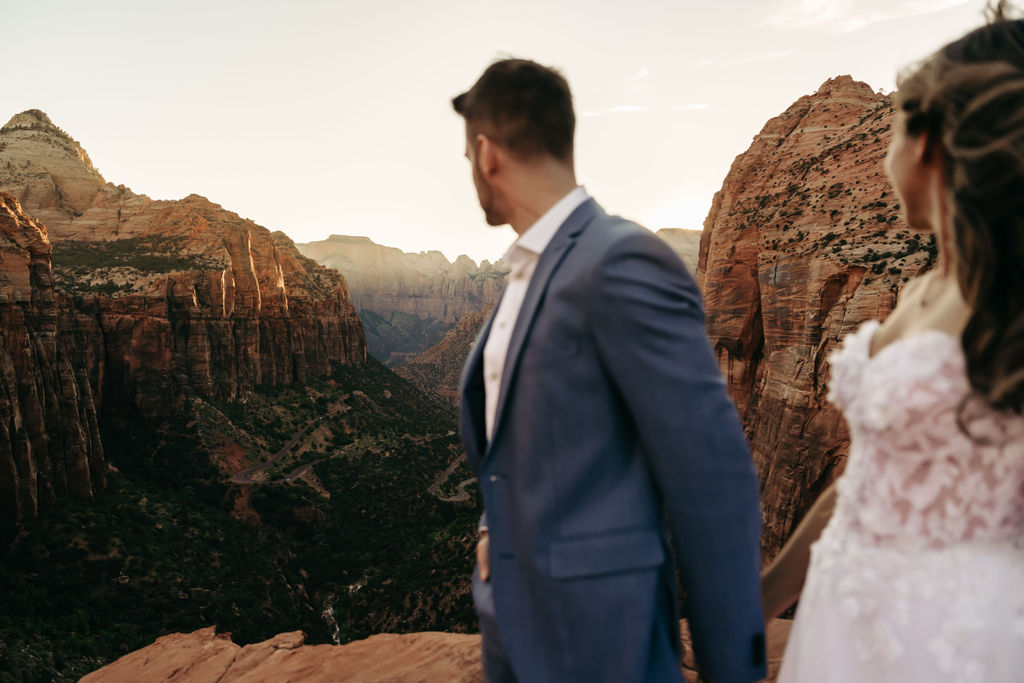 couple looking at the mountains in utah