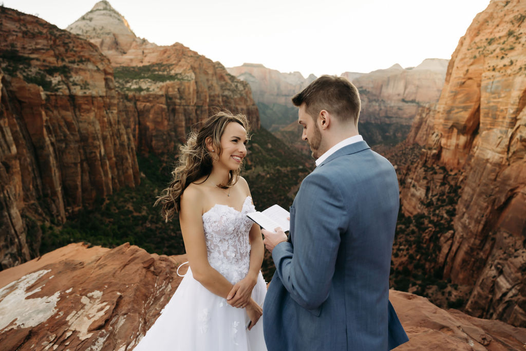 groom reading his vows at the intimate mountain elopement 