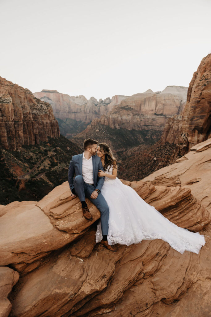 couple kissing at zion national park 