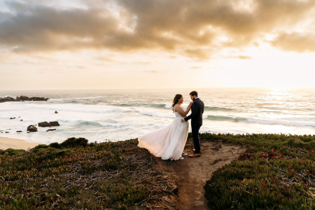 amazing couple at their vow renewal elopement photoshoot with the sun in the background