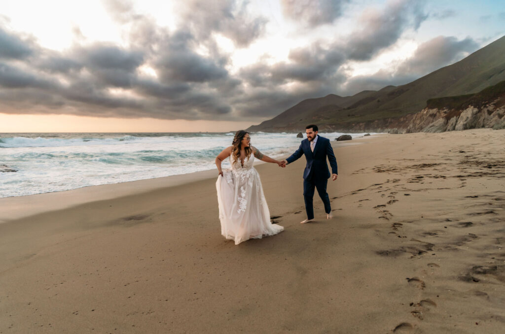 couple running during their elopement at their vow renewal elopement 