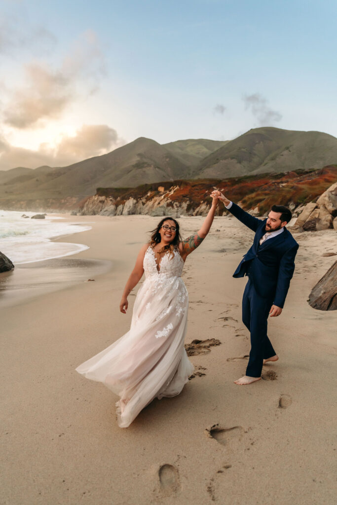 couple at the beach at their vow renewal elopement